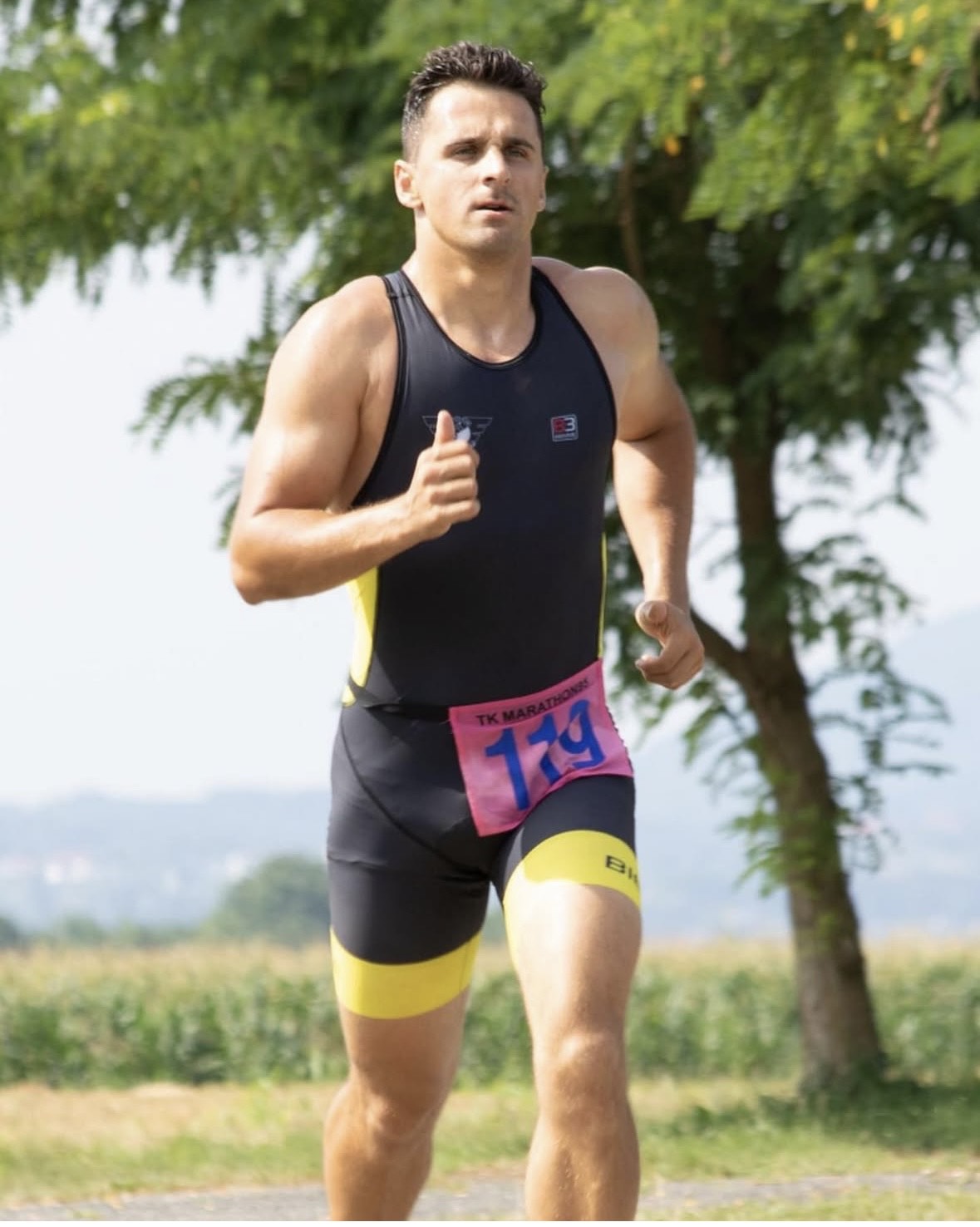 Martin Papista coaching athletes during triathlon training session